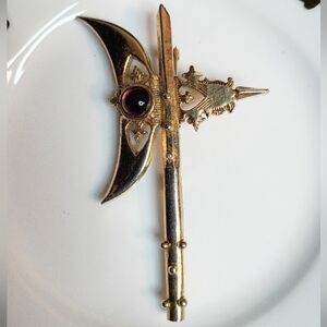 Vintage Gold-Tone Crescent Axe Brooch with Red Cabochon